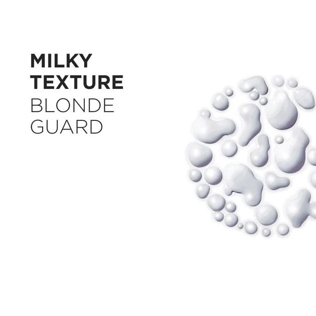 Kérastase Blond Absolu Blonde Guard hoitosuihkeen maitomainen koostumus vaalennetuille ja raidoitetuille hiuksille