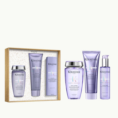 Kérastase Blond Absolu Fondant Holidays Coffret on ylellinen lahjapakkaus, joka sisältää kolme hiustenhoidon huipputuotetta vaalennetuille, raidoitetuille ja harmaille hiuksille.