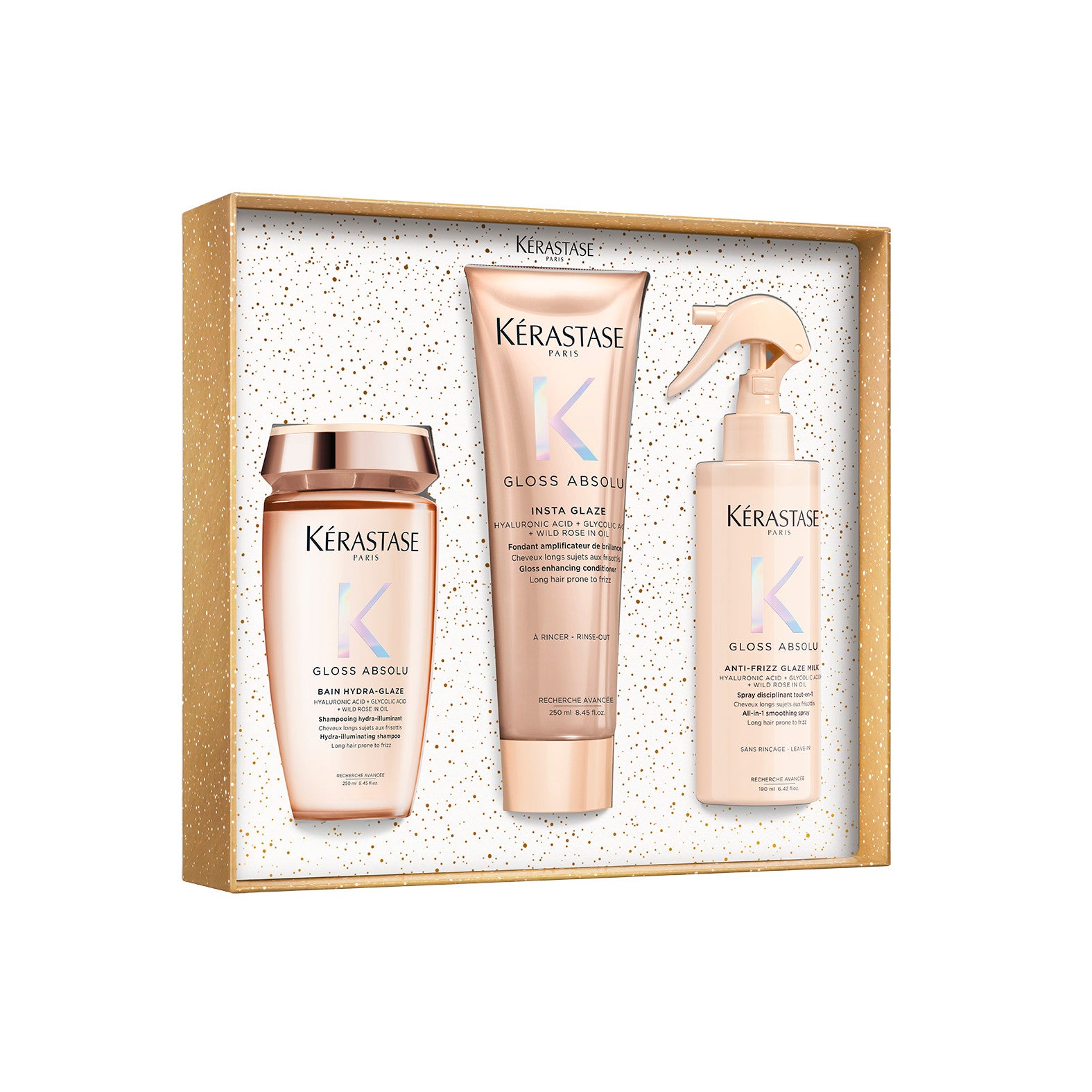 Kérastase Gloss Absolu Holiday Set sisältää shampoon, hoitoaineen ja lämpösuojasuihkeen pitkille, pörröisille hiuksille.